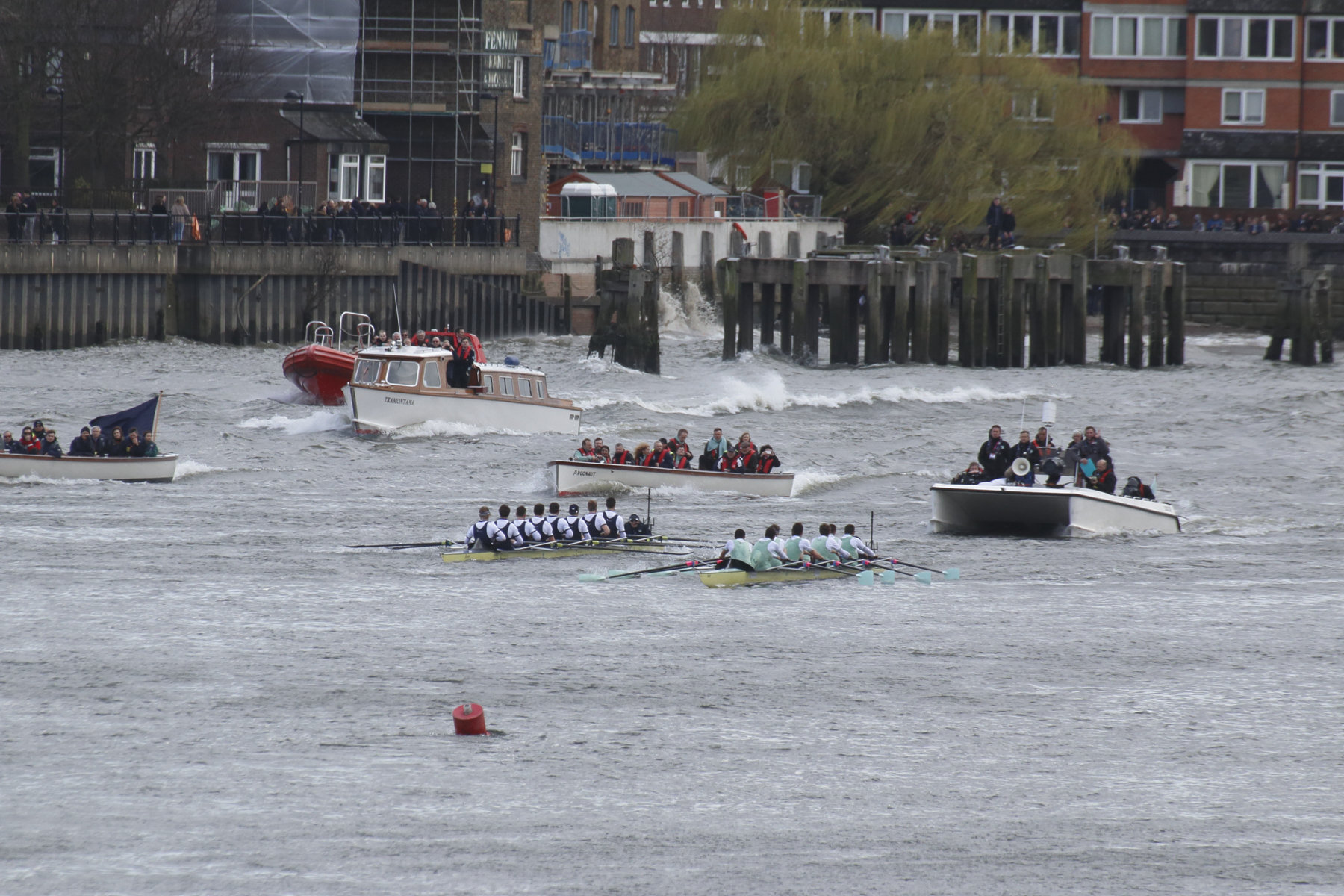 rowboats racing on a river